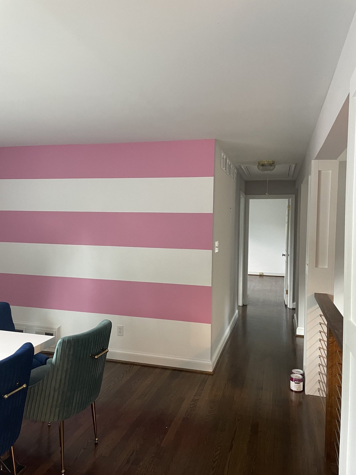 Striped pink and white wall precision paint work